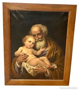 Arte: Antiguo óleo sobre lienzo de San José con el niño Jesús. S.XVIII. 100x79. Marco nogal.